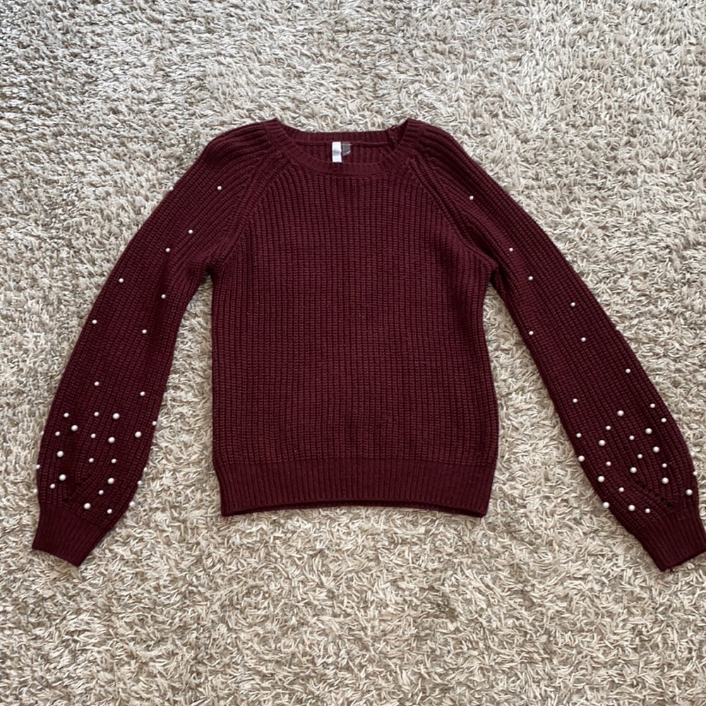 Maroon sweater with pearls on sleeve